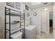 Bright bathroom features a stylish vanity with coastal-themed decor, creating a relaxing atmosphere at 5840 Liddell Dr, New Port Richey, FL 34652