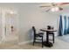 An adjacent eating area with seating for two is bathed in natural light at 5840 Liddell Dr, New Port Richey, FL 34652