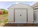 Exterior view of the backyard shed at 5840 Liddell Dr, New Port Richey, FL 34652
