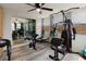 Bright workout room featuring modern equipment and wood-look floors at 5840 Liddell Dr, New Port Richey, FL 34652