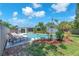 Beautiful backyard pool with lounge chairs and landscaping at 5927 10Th N St, St Petersburg, FL 33703