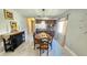 Dining room with marble floors, and direct access to the kitchen at 6424 Thicket Trl, New Port Richey, FL 34653