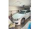 Garage with a white car at 6424 Thicket Trl, New Port Richey, FL 34653