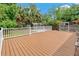 Spacious backyard deck with white railings, ideal for outdoor gatherings and relaxation at 6625 Interbay Blvd, Tampa, FL 33611