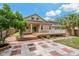 Beautiful view of the back of the home with a lovely wooden deck, perfect for entertaining guests at 6625 Interbay Blvd, Tampa, FL 33611