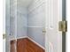 Spacious walk-in closet with wire shelving and wood-look floors provides ample storage at 6625 Interbay Blvd, Tampa, FL 33611