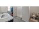 Bright bathroom with double sinks, shower, and toilet at 7641 Sail Clover Ln, Zephyrhills, FL 33540