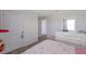 Bright bedroom with a playful atmosphere and simple decor at 7641 Sail Clover Ln, Zephyrhills, FL 33540