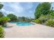 Backyard oasis with swimming pool, patio and mature landscaping at 7902 Heather Ct, Tampa, FL 33634