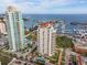 Breathtaking aerial view of waterfront condo towers with marina, offering luxury living and stunning ocean views at 100 Beach Ne Dr # 301, St Petersburg, FL 33701