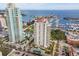 An aerial view showcases luxury condos with marina, pool, and ocean views, highlighting a prime location for upscale living at 100 Beach Ne Dr # 301, St Petersburg, FL 33701
