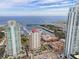 An aerial view showcases luxury condos with marina, pool, and ocean views, highlighting a prime location for upscale living at 100 Beach Ne Dr # 301, St Petersburg, FL 33701