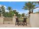 Beautiful outdoor balcony featuring stone balustrade, brick floor, and table with chairs overlooking the city at 100 Beach Ne Dr # 301, St Petersburg, FL 33701