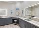 Elegant bathroom with granite countertops, modern sinks, and vanity area at 100 Beach Ne Dr # 301, St Petersburg, FL 33701