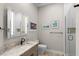 Modern bathroom featuring a granite vanity top and a glass enclosed shower at 100 Beach Ne Dr # 301, St Petersburg, FL 33701
