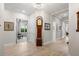 Spacious foyer features wood floors, high ceilings, and classic grandfather clock adding charm at 100 Beach Ne Dr # 301, St Petersburg, FL 33701