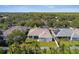 An aerial view of a home with a well-kept lawn at 10244 Shadow Branch Dr, Tampa, FL 33647