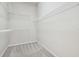 Walk-in closet with shelving for easy storage and organization at 10244 Shadow Branch Dr, Tampa, FL 33647