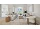 Living room features a cozy sofa, stylish decor, and lots of natural light at 10244 Shadow Branch Dr, Tampa, FL 33647
