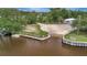Aerial view of a community boat ramp, providing easy access to the water for boating and recreational activities at 106 N Saint George Cir, Apollo Beach, FL 33572