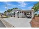 Charming single-story home with well-maintained landscaping, a covered parking area, and curb appeal at 106 N Saint George Cir, Apollo Beach, FL 33572
