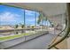 A screened-in porch provides an excellent view of the canal, perfect for relaxation at 106 N Saint George Cir, Apollo Beach, FL 33572