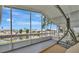 Enjoy canal views from this home's screened-in porch, a cozy spot for outdoor relaxation at 106 N Saint George Cir, Apollo Beach, FL 33572