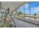 Relaxing screened-in porch overlooking the canal, offering a tranquil outdoor living space at 106 N Saint George Cir, Apollo Beach, FL 33572