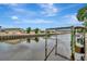 Waterfront community with views of serene canal and boat docks, perfect for boating enthusiasts at 106 N Saint George Cir, Apollo Beach, FL 33572
