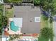 Bird's eye view of a home showcasing a backyard with a refreshing pool and a spacious patio area at 12306 91St Ter, Seminole, FL 33772