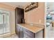 Convenient bar area with wine storage and easy access to the patio at 12306 91St Ter, Seminole, FL 33772