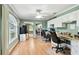 Spacious home office with dual workstations, mirrored closets, and bright windows at 12306 91St Ter, Seminole, FL 33772