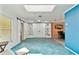 Spacious living room with a skylight and stylish built-in shelving at 12306 91St Ter, Seminole, FL 33772