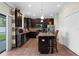 Well-equipped kitchen features granite countertops, stainless steel appliances, and a center island at 13913 Felix Will Rd, Riverview, FL 33579