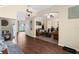 Open-concept living space features wood floors and archways with views to the backyard at 13913 Felix Will Rd, Riverview, FL 33579