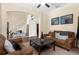 Inviting living room with hardwood floors, comfortable seating and decorative wall art at 13913 Felix Will Rd, Riverview, FL 33579