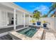 Inviting backyard featuring a water feature, creating a serene and stylish outdoor living space at 146 26Th Ne Ave, St Petersburg, FL 33704