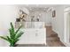 Stylish kitchen bar with marble countertop and views into the connected living spaces at 146 26Th Ne Ave, St Petersburg, FL 33704