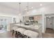 Bright kitchen featuring marble countertops, stainless steel appliances, and stylish pendant lights at 146 26Th Ne Ave, St Petersburg, FL 33704