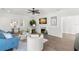 Bright living room with a cozy fireplace, complemented by hardwood floors and contemporary decor at 146 26Th Ne Ave, St Petersburg, FL 33704