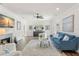 Elegant living room with hardwood floors, a fireplace, and stylish decor, perfect for entertaining at 146 26Th Ne Ave, St Petersburg, FL 33704