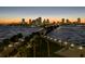 Picturesque skyline view with pier extending into the water at sunset at 146 26Th Ne Ave, St Petersburg, FL 33704