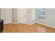 Inviting entryway with hardwood floors, a front door, and a window allowing natural light at 1502 Marsh Wood Dr, Seffner, FL 33584