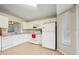 Eat-in kitchen offers white appliances and tile floors for easy maintenance at 1502 Marsh Wood Dr, Seffner, FL 33584