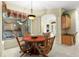 Charming breakfast nook filled with natural light near the kitchen at 16608 Livingston Ave, Lutz, FL 33559