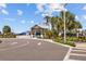 Entrance to Southshore Bay featuring a wooden archway and well-manicured landscaping at 17005 Avon Dive Ln, Wimauma, FL 33598