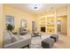 Bright living room with large window, recessed lighting, and modern furniture at 17910 Timber View St, Tampa, FL 33647
