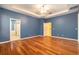 An ample main bedroom provides a full bath and expansive walk-in closet at 17910 Timber View St, Tampa, FL 33647