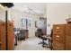 Home office includes built-in shelves, a work station and natural light at 1803 143Rd E Ct, Bradenton, FL 34212