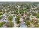 An aerial shot showcases the property within the residential neighborhood at 1909 Dover Ct, Oldsmar, FL 34677